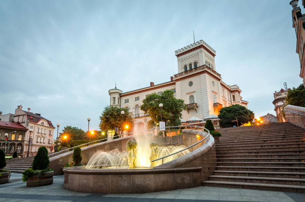 Main city square in Bielsko-Biala with fountain in front of Sulk